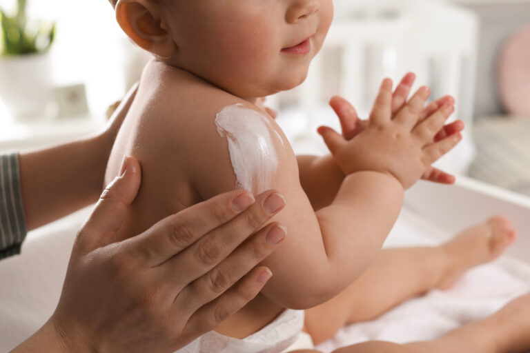 Mother applying Bio-Baby Skincare range to the baby