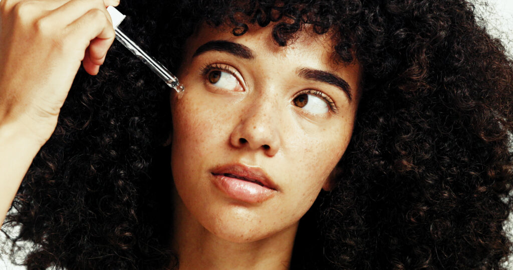 Woman using a serum