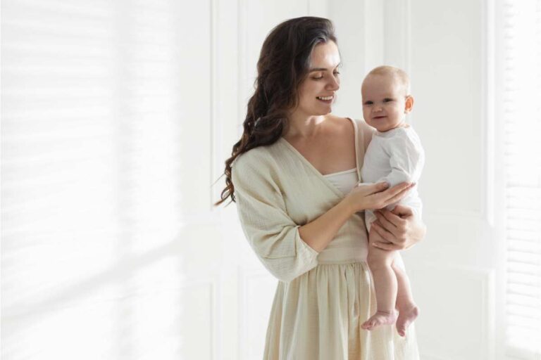 Preparing for breastfeeding with gentle skin barrier support as a mother holds her baby in a calm, nurturing environment